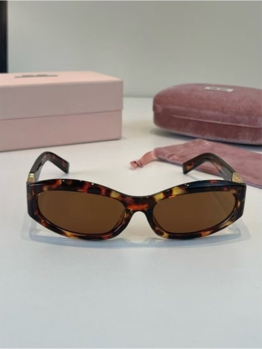Miu Miu Tortoiseshell Frame Sunglasses with Brown Lenses